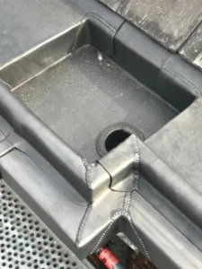 Lead gutter and outlet on listed building