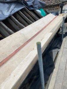 replacing a lead gutter lining