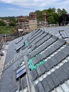 welsh slates loaded on roof