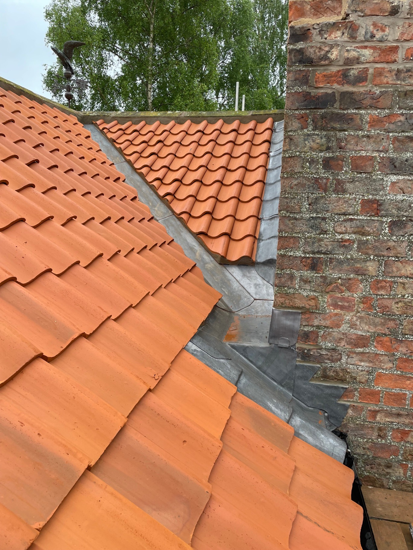 Lead valley repair with pantiles